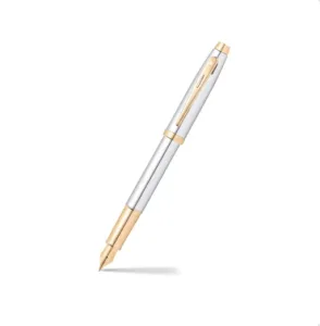 Pluma Sheaffer Serie 100 GT Cromo con cuerpo metálico plateado y detalles dorados, plumín de acero inoxidable bicolor, presentada en estuche elegante Sheaffer con guía de bienvenida.