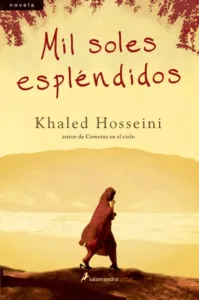 Mil soles espléndidos portada de la novela de Khaled Hosseini ambientada en Afganistán con figura femenina caminando