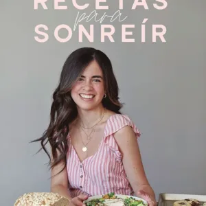 Recetas para sonreír portada del libro de cocina con autora presentando platos saludables